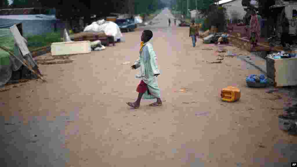 A Muslim child walks in front of the mosque at PK12 in Bangui, Central African Republic, April 10, 2014.