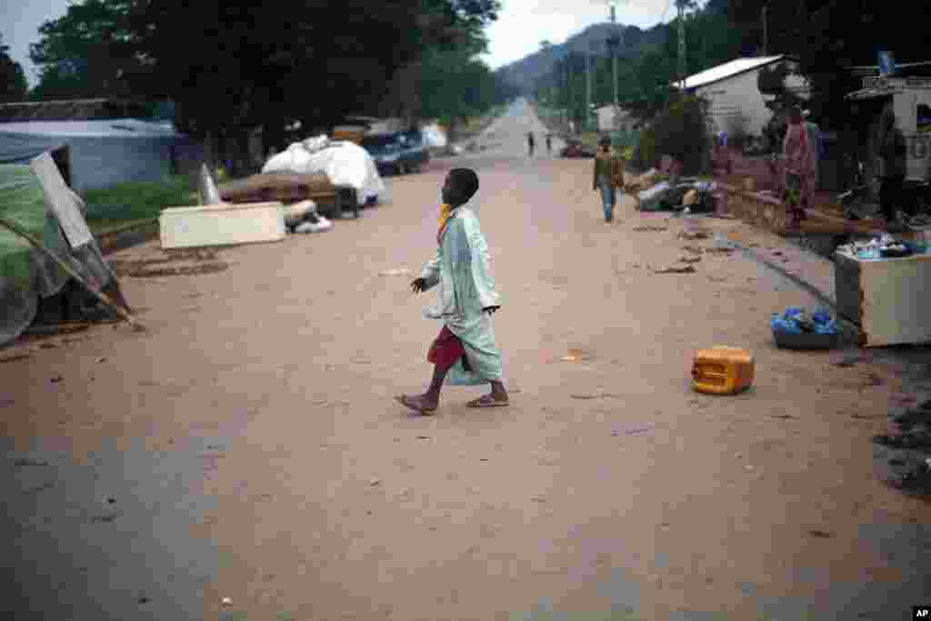 A Muslim child walks in front of the mosque at PK12 in Bangui, Central African Republic, April 10, 2014.