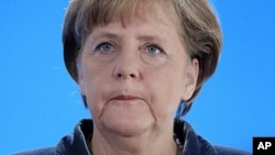 German Chancellor Angela Merkel speaks in Kiel, northern Germany, January 14, 2012.