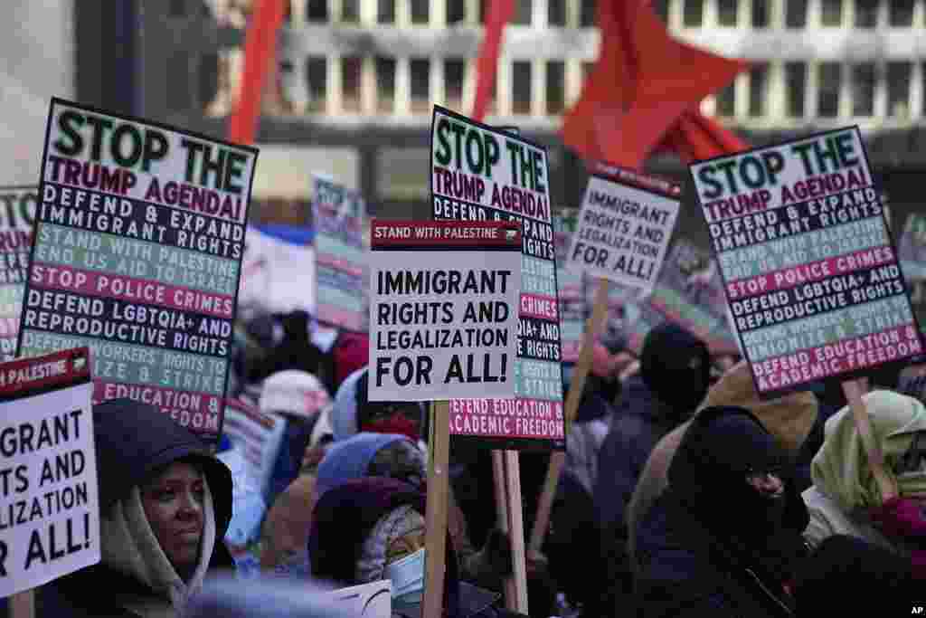 Anti-Trump protesters march to Trump Tower as they rally for a number of issues, including immigrant rights, the Israel-Hamas war, women's reproductive rights and racial equality, in Chicago, Jan. 20, 2025.