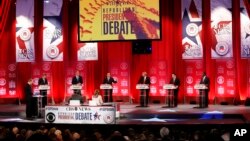 Republican presidential candidates, from left, Ohio Gov. John Kasich, former Florida Gov. Jeb Bush, Sen. Ted Cruz, R-Texas, businessman Donald Trump, Sen. Marco Rubio, R-Fla., retired neurosurgeon Ben Carson participate during the CBS News Republican presidential debate at the Peace Center in Greenville, South Carolina, Feb. 13, 2016.