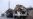 Syrian Troops Surround Rebel-held Town on 3 Sides