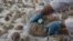 FILE -  Conservators work on pieces of statues damaged by the Taliban, in National Museum of Afghanistan in Kabul, Afghanistan October 13, 2019. picture taken October 13, 2019.REUTERS/Omar Sobhani