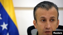 FILE - Venezuela's Vice President Tareck El Aissami talks to the media during a news conference in Caracas, Venezuela, Nov. 17, 2017. 