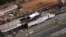 An overhead view of the wreckage of a train crash is seen near Santiago de Compostela, northwestern Spain, in this still image from video, July 25, 2013.