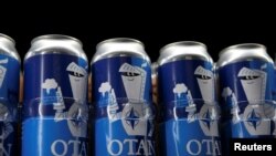 FILE PHOTO: Nato-branded OTAN beer cans by Olaf Brewing Company are pictured in Savonlinna