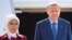 Turkish President Recep Tayyip Erdogan and his wife, Emine, arrive at the Tegel airport in Berlin, Germany, Sept. 27, 2018. 