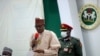 Le président du Nigeria, Muhammadu Buhari, s'exprime lors d'une réunion avec les écoliers libérés, le vendredi 18 décembre 2020, à Katsina, au Nigeria. 