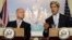 U.S. Secretary of State John Kerry gestures as he speaks during a joint news conference with British Foreign Secretary William Hague at the State Department, Jun. 12, 2013.