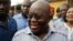 FILE - In his first 100 days in office, Nana Akufo-Addo, shown after casting his vote in Kibi in Ghana's elections Dec. 7, will be sending "a clear signal ... that he intends to run this country well," his spokesman says.