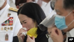Kris Aquino, the youngest sister of former Philippine President Benigno Aquino III, cries during state burial rites on June 26, 2021, at a memorial park in suburban Paranaque city, Philippines.