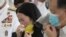 Kris Aquino, the youngest sister of former Philippine President Benigno Aquino III, cries during state burial rites on June 26, 2021, at a memorial park in suburban Paranaque city, Philippines.