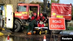 Rescue workers lift a person on a stretcher in the aftermath of Storm Bert, near Billing Aquadrome, Britain, on Nov. 25, 2024.