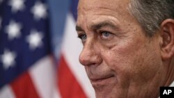 U.S. House Speaker John Boehner talks to reporters on Capitol Hill, Jan. 13, 2015.