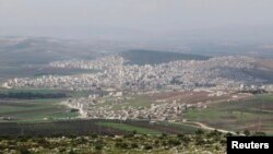 FILE - A general view shows the Kurdish city of Afrin, in Aleppo's countryside, March 18, 2015. 