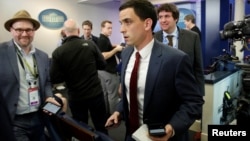 Trey Yingst (center) of One American News Network and other journalists depart after an off camera "gaggle" meeting with White House Press Secretary Sean Spicer while New York Times reporter Glen Thrush (left), who was excluded along with several other major news organizations, reacts at the White House in Washington, Feb. 24, 2017.