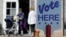 FILE - Voters leave a polling station in Charlotte, North Carolina, May 8, 2018.