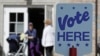 FILE - Voters leave a polling station in Charlotte, North Carolina, May 8, 2018.