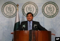 FILE - Pakistan's Foreign Ministry spokesman Mohammad Faisal briefs journalists in Islamabad, Pakistan, Feb. 4, 2018.