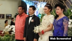 Prime Minister Hun Sen and his wife in picture with Sok Sokan, the son of the late Council of Ministers President Sok An, and Sam Ang Leakhena whose parents own Vattanac Capital on their wedding day in June. (Web Screenshot)