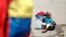 A Venezuelan boy sits next to family belongings at the Pacaraima border control, Roraima state, Brazil, Aug. 20, 2018. 