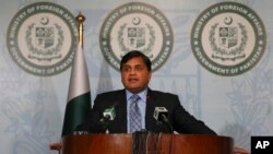 FILE - Pakistan's Foreign Ministry spokesman Mohammad Faisal briefs journalists in Islamabad, Pakistan, Feb. 4, 2018.