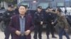 中国民革委员挑战泸州命案结论受压改看法