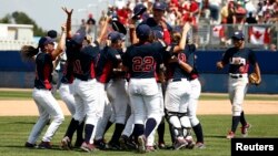 US baseball players celebrate after winning the gold medal at the Pan American Games.