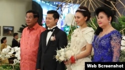 Prime Minister Hun Sen and his wife in picture with Sok Sokan, the son of the late Council of Ministers President Sok An, and Sam Ang Leakhena whose parents own Vattanac Capital on their wedding day in June. (Web Screenshot)