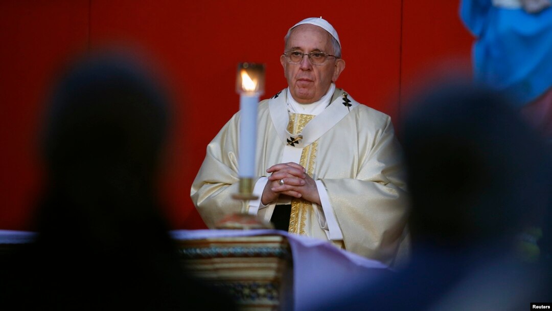 Pope Francis celebrates a mass on All Saints' Day at the Verano cemetery in Rome, Nov. 1, 2014. 