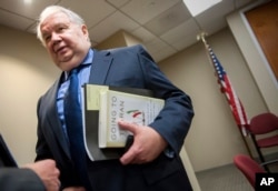 FILE - Russia's ambassador to the U.S. Sergey Kislyak, speaks with reporters in Washington. Contacts with Kislyak are at the center of the latest controversy surrunding the Trump administration.