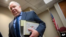 Russia's ambassador to the U.S. Sergey Kislyak, speaks with reporters in Washington.