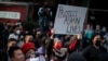 FILE - People take part in a Stop Asian Hate rally at Times Square in New York City, April 4, 2021.