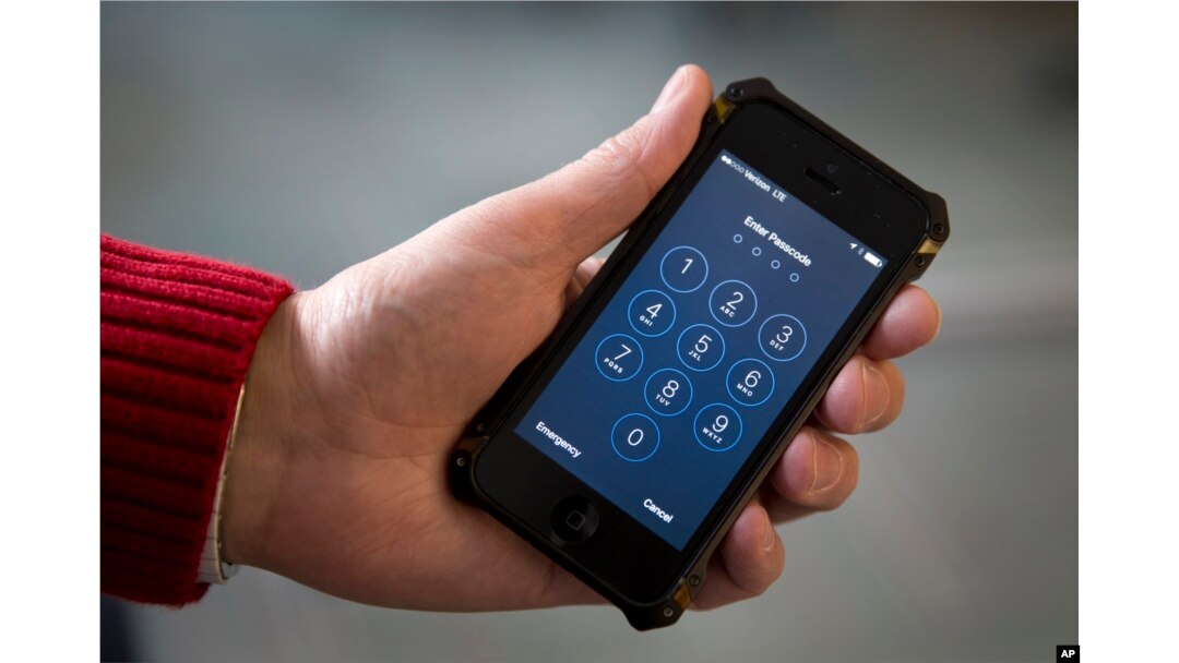 An iPhone is pictured in Washington, Feb. 17, 2016. Border agents have long had the right to search travelers' physical luggage without a warrant, and that interpretation has been expanded to include digital devices, ACLU staff attorney Nathan Freed Wessler says..