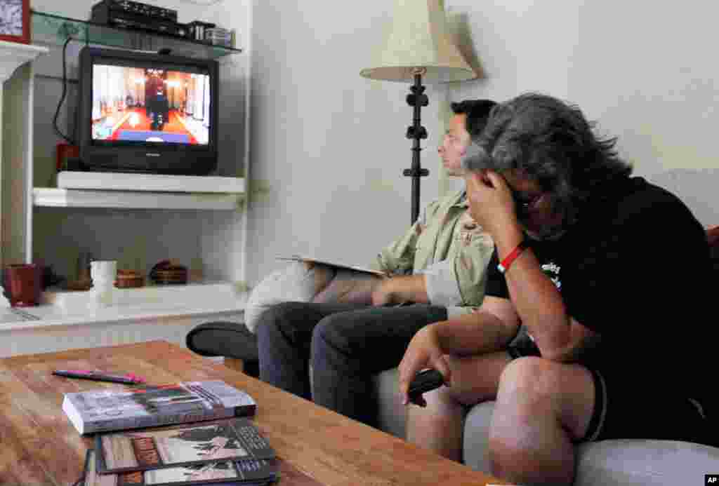 June 22: Rosanna Cambron (R), whose son Arturo is serving in the U.S. military in Iraq, cries as she watches President Obama speak. Obama announced a plan to start bringing U.S. troops home from Afghanistan in a significant first step toward ending the lo