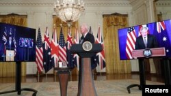 Президент США Джо Байден під час виступу з присутніми на відеозв’язку прем’єр-міністрами Австралії та Великої Британії 15 вересня 2021 р.