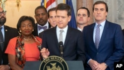 New York State Senator Brad Hoylman, D-Manhattan, center, speaks during a news conference, May 8, 2019, at the Capitol in Albany, N.Y., about a Senate bill to authorize the release of individual New York state tax returns to Congress. 