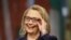 Secretary of State Hillary Rodham Clinton adjusts her glasses during a Global Townterview at the Newseum in Washington, January 29, 2013.