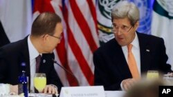 U.N. Secretary-General Ban Ki-moon, left, and U.S. Secretary of State John Kerry speak before a meeting of the International Syria Support Group at a hotel in New York, Dec. 18, 2015. 