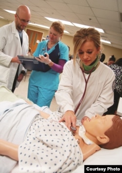Nursing students practice on a model patient at Roane State Community College in Oak Ridge, Tennesee