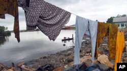 A slum in Port Harcourt, Nigeria is one of many across the continent