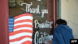 A mural in memory of Jimmy Carter is painted on a storefront at the Jimmy Carter National Historic Park in Plains, Georgia, on Dec. 30, 2024. 