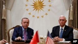 R. T. Erdogan û Mike Pence