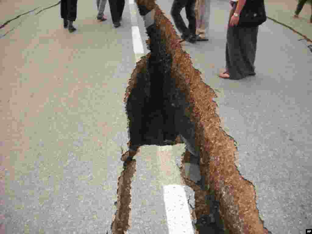 A road damaged by the earthquake in Tarlay, Shan state in Burma, March 25, 2011