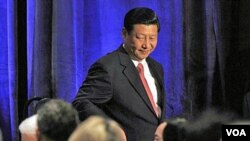 Wakil Presiden Tiongkok Xi Jinping saat memberikan pidato di depan US-China Business Council di Washington (15/2).