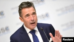 FILE - Anders Fogh Rasmussen, former NATO secretary-general, speaks during the annual Munich Security Conference in Munich, Germany, Feb. 16, 2019.