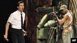 Andrew Rannells, left, and the cast of "The Book of Mormon" perform during the 65th annual Tony Awards, June 12, 2011 in New York.