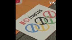 日本反对举办奥运的民众举行示威
