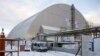 Giant Protective Arch Slides Over Chernobyl Site