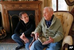 Tim Hotchner, left, a documentary filmmaker and writer, listens as his father, Ernest Hemingway's biographer and good friend A.E. Hotchner, recounts stories of "the real Hemingway," Jan. 22, 2019.